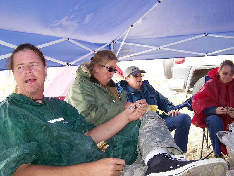 No 29 Blue forrest Wyoming area, Rob and wife debby and Steve and wife Diane keeping dry.  .JPG